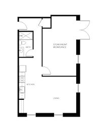 A floor plan of a house with a living room, kitchen, and bathroom.