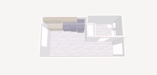 A white room with a bed and a chair.