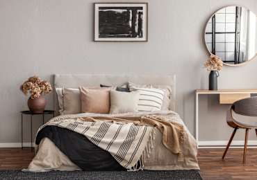 Bedroom with bed and mirror at Life At Agora, Ohio