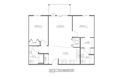 A floor plan of a unit with a bedroom, living room, and bathroom.