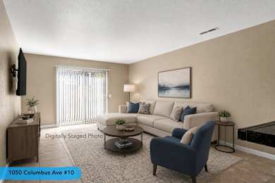 Digitally staged living room with modern furnishings at Cedar Park Apartments, Chico