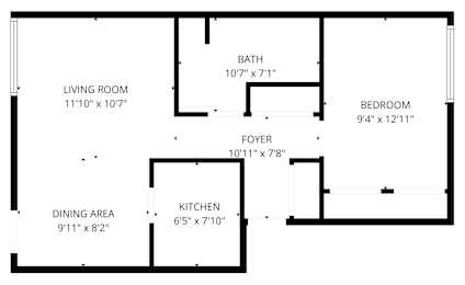 A floor plan of a house with a living room, dining area, kitchen, bedroom, bathroom and foyer.
