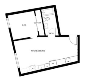 A floor plan of a small apartment with a bed, bathroom, and kitchen/living room.