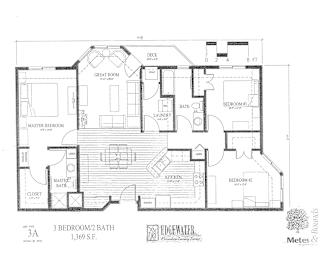 A floor plan of a house with a master bedroom suite and a second bedroom suite.