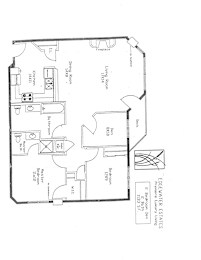 A floor plan of a house with a living room, dining room, kitchen, and two bathrooms.