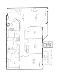 A floor plan of a house with a kitchen, living room, and two bedrooms.