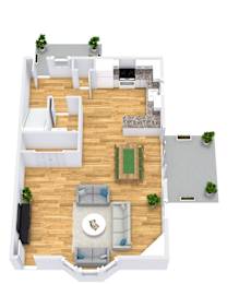 A top-down view of a living room with a sofa, coffee table, and kitchen area.