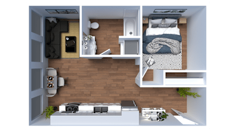 A top-down view of a small, neatly organized apartment with a bed, desk, and kitchenette.