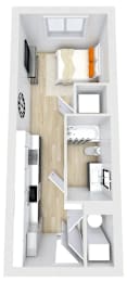 A small apartment with a bed, a couch, a table, and a TV.
