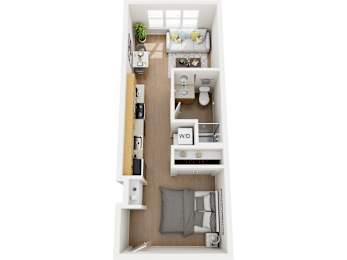 A small white room with a bed, a desk, a couch, and a plant.