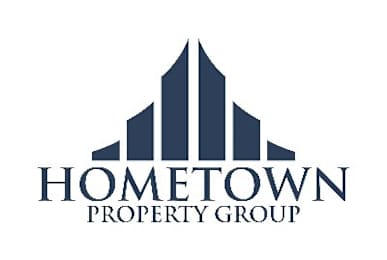 The image is a logo of a property group named Hometown Property Group.