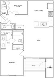 A floor plan of a small apartment with a kitchen, living room, and bedroom.