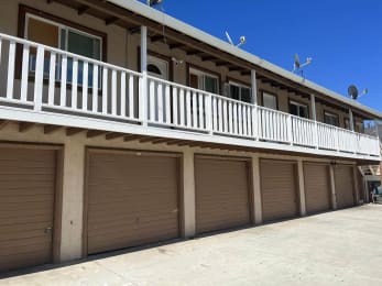 a row of garage doors on the side of a building