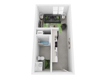 A white box with a green rug and a black speaker.