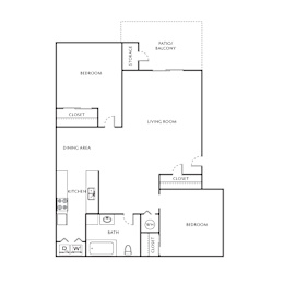 A floor plan of a home with a living room, dining area, kitchen, and two bedrooms.