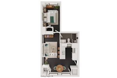 a bedroom with a bed and a chair in a small room