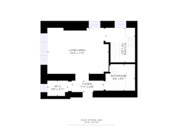 A floor plan of a small apartment with a living area, kitchen, and bathroom.