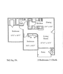 A drawing of a house layout with two bedrooms, a living room, a kitchen, a dining room, and a patio.