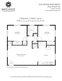 A floor plan for a 2 bedroom apartment with a living and dining area, and a kitchen.
