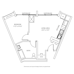 A floor plan of an apartment with a bedroom, living area, and bathroom.