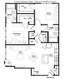 A floor plan of a house with a garage and a patio.