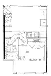 A floor plan of a small apartment with a bedroom, bathroom, and closet.