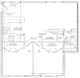 A black and white image of a floor plan for a kitchen and bathroom.