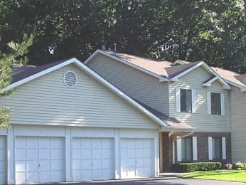 A house with a garage and a window.