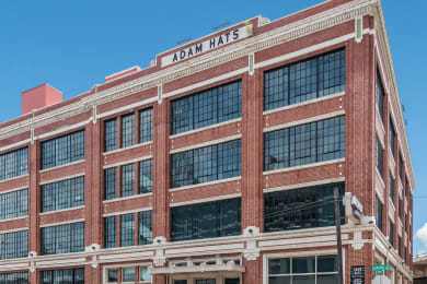 Floor Plan  a large brick building with a sign that reads 40mm hass