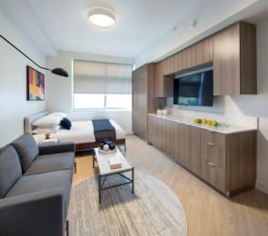 Floor Plan  a room with a bed and a kitchen in a hotel room