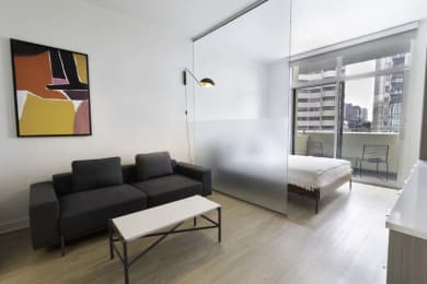 Floor Plan  a living room with a couch and a table