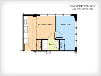 A floor plan of a one bedroom unit with a kitchen/living area, bathroom, and bedroom.