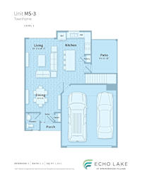 A floor plan for a townhome with a living room, kitchen, dining room, and a bathroom.