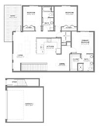 Three-bedroom apartment floor plan featuring open living and dining area, central kitchen with island, two bathrooms, in-unit laundry, large patio, and attached garage below.