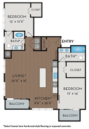 A floor plan of a home with two bedrooms, a living room, a kitchen, a balcony, and two bathrooms.
