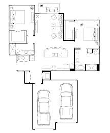 A black and white floor plan of a house with two cars.
