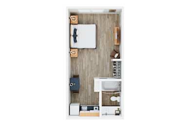A small room with a bed, a sink, and a toilet.