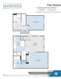 A blueprint of a 2 bedroom apartment with a living room and two bathrooms.