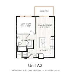 One-bedroom apartment with entry into the kitchen featuring an island and adjacent living/dining area with balcony access. Bedroom with direct bathroom access and nearby closet space. In-unit washer and dryer and mud area included.