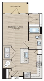 A floor plan of a bedroom with living area, closet, and bathroom.