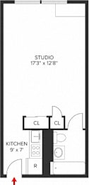 A floor plan of a studio apartment with a kitchen and a studio space.