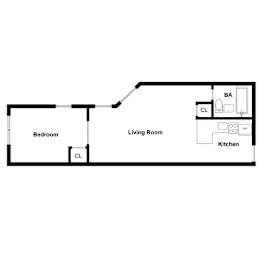 A floor plan of a small apartment with a bedroom, living room, and kitchen.
