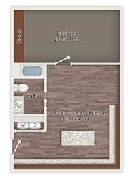 A floor plan of a room with a bedroom, bathroom, and living/dining/kitchen area.