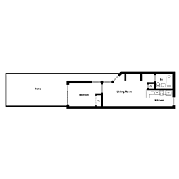 A floor plan of a house with a living room, kitchen, bedroom, and patio.