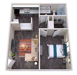 A top down view of a small apartment with a living room, kitchen, and bedroom.