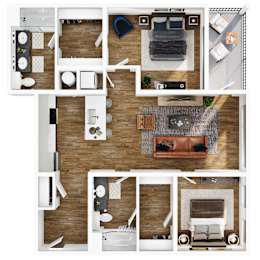 A top-down view of a modern living room with a couch, coffee table, and kitchen area.