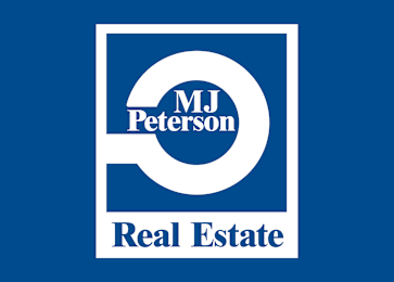 A logo for MJ Peterson Real Estate.