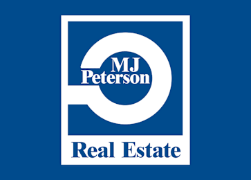 A logo for MJ Peterson Real Estate.