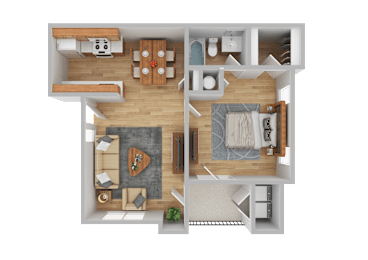 A top-down view of a living room with a couch, coffee table, and kitchen area.