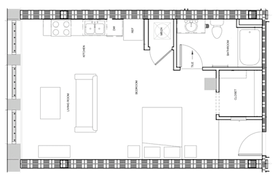 A floor plan of a house with a kitchen, living room, and bathroom.
